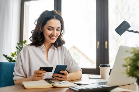 business woman using credit card photo