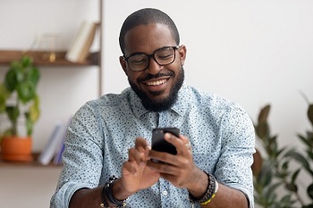 man holding mobile phone