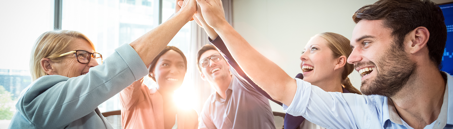 group of people high-fiving